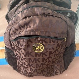 MK backpack EUC brown with gold hardware